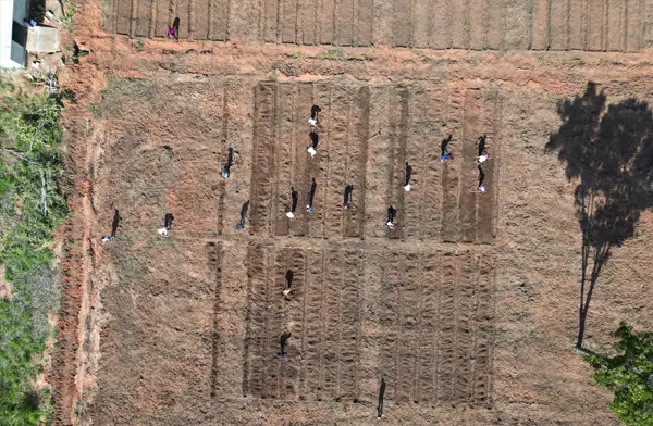 Agricultural school Tanzania - Field from above with working students